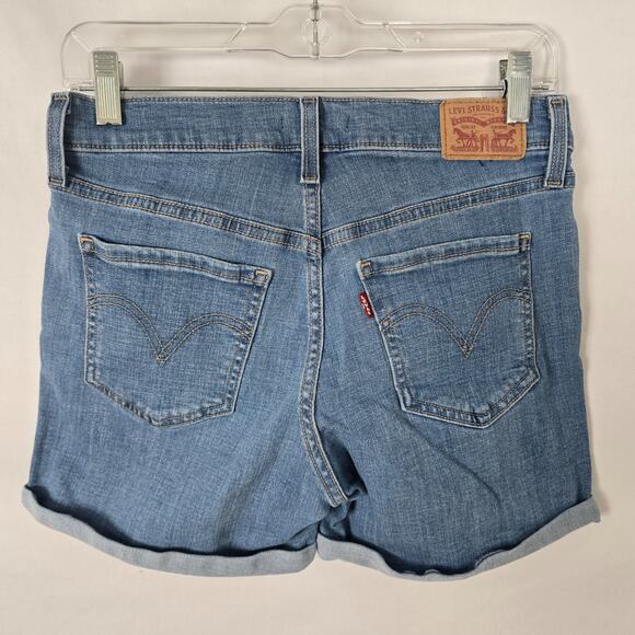 Levi's Jean Shorts Women's 28 Blue Medium Wash Mid Length Cuffed - Picture 2 of 12